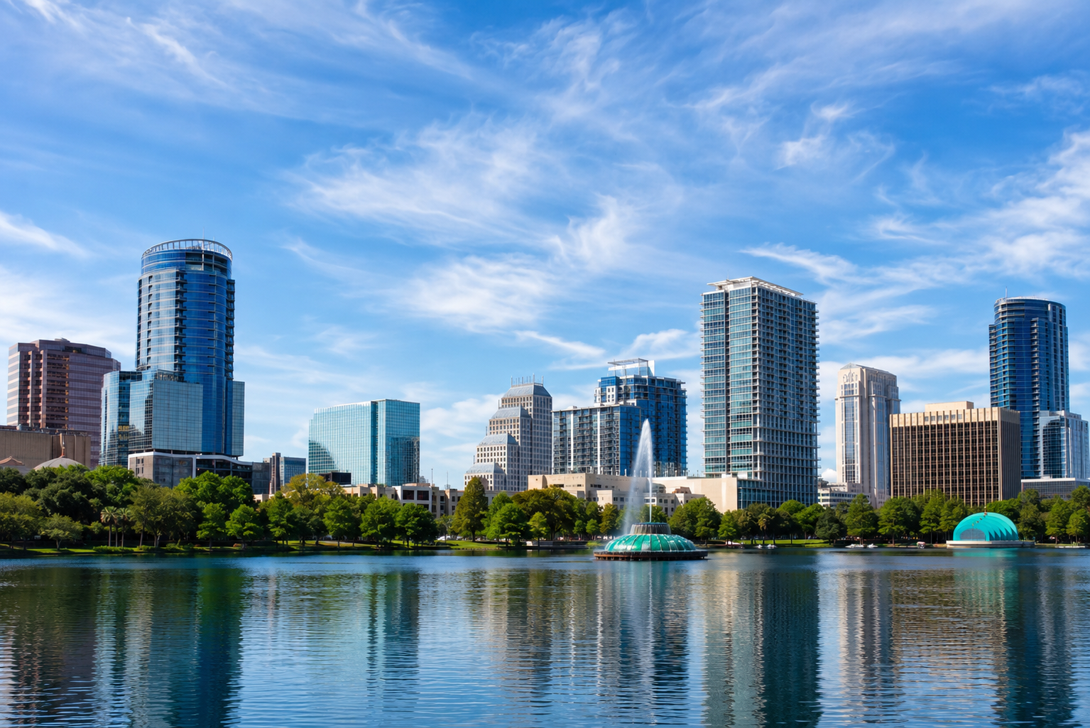 Orlando, Florida skyline during the day, reflected in water.